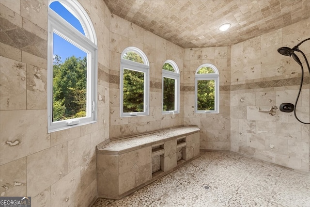 932 Shadowford Fls, Lithonia, GA 30058 - full bathroom featuring a tile shower and tile walls