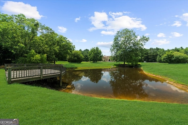 932 Shadowford Fls, Lithonia, GA 30058 - view of property's community with a water view and a lawn
