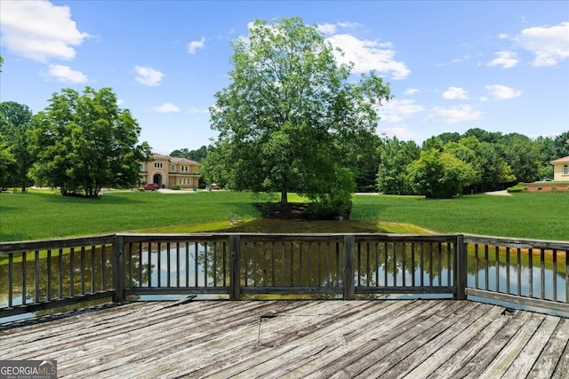 932 Shadowford Fls, Lithonia, GA 30058 - wooden deck featuring a water view and a lawn