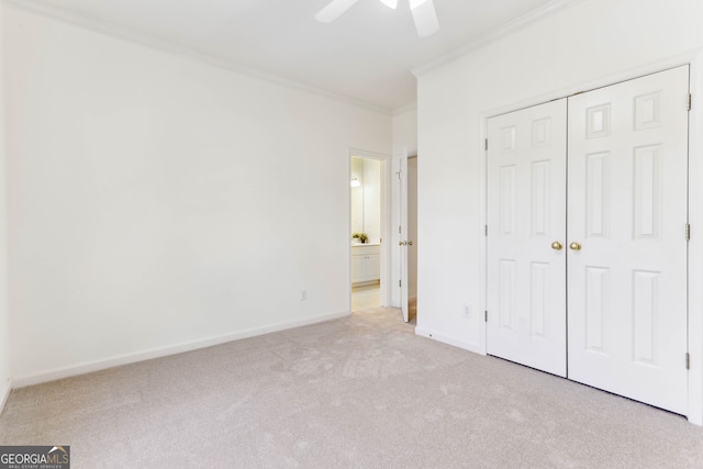 2516 Woolwich Ct, Acworth, GA 30101 - unfurnished bedroom featuring ornamental molding, light colored carpet, a closet, ensuite bath, and a ceiling fan