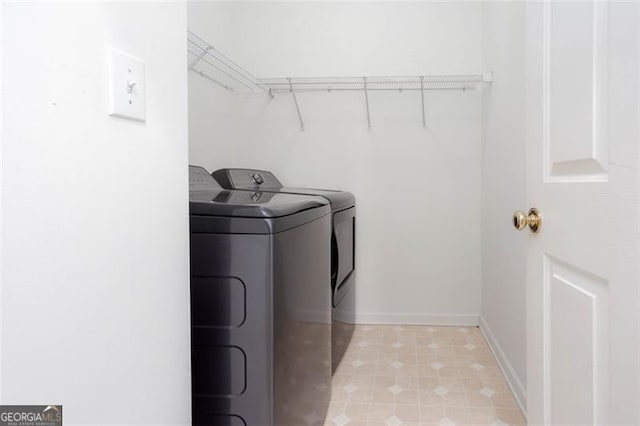 2516 Woolwich Ct, Acworth, GA 30101 - laundry area with washing machine and dryer and baseboards