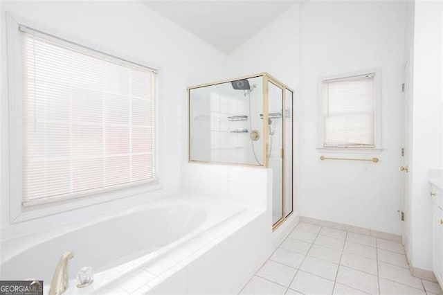 2516 Woolwich Ct, Acworth, GA 30101 - full bathroom with a garden tub, vanity, a shower stall, tile patterned floors, and plenty of natural light