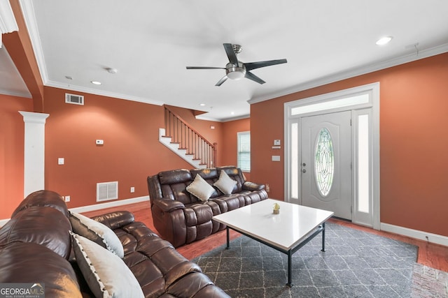 2670 Trotters Pointe Dr, Snellville, GA 30039 - living area with wood finished floors, a ceiling fan, stairs, ornamental molding, and recessed lighting