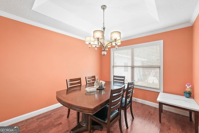 2670 Trotters Pointe Dr, Snellville, GA 30039 - dining space with a chandelier, ornamental molding, and wood finished floors
