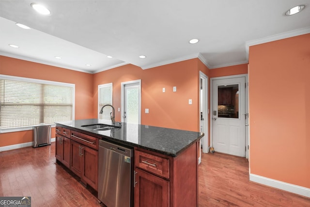 2670 Trotters Pointe Dr, Snellville, GA 30039 - kitchen with stainless steel dishwasher, crown molding, light wood-style flooring, recessed lighting, and dark stone countertops