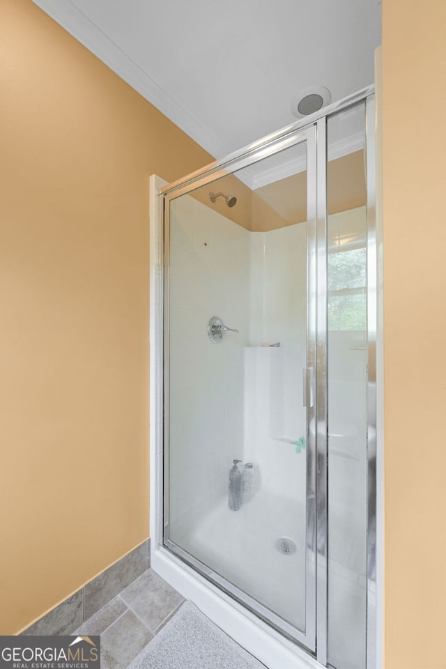 2670 Trotters Pointe Dr, Snellville, GA 30039 - bathroom featuring a stall shower and ornamental molding