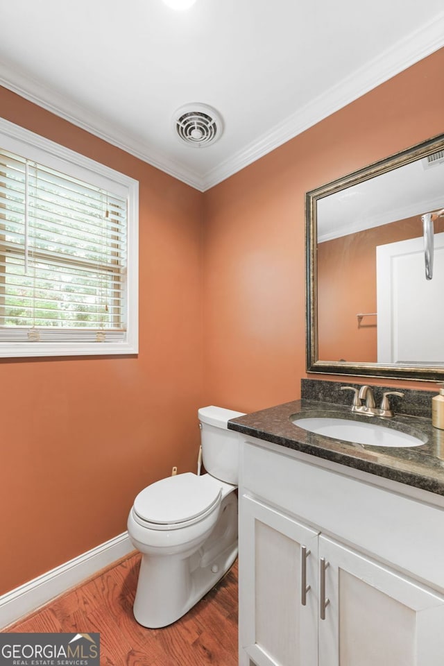 2670 Trotters Pointe Dr, Snellville, GA 30039 - bathroom featuring vanity, ornamental molding, and wood finished floors