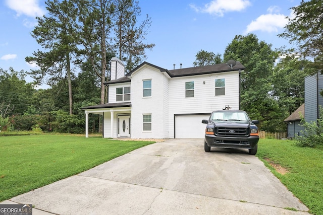 2670 Trotters Pointe Dr, Snellville, GA 30039 - view of front of house featuring concrete driveway, an attached garage, a front lawn, and a chimney