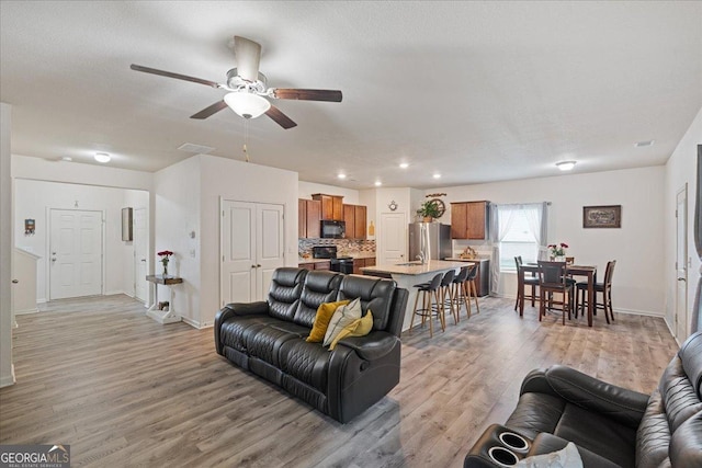 255 Morning Dr, Athens, GA 30606 - living room with light wood finished floors, a ceiling fan, and recessed lighting