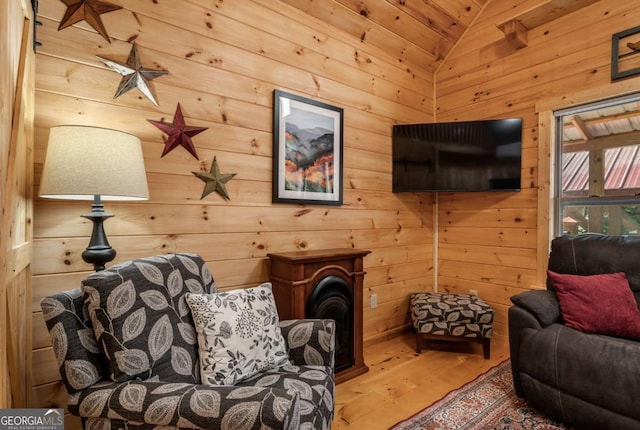 72 Bentley Cv, Murphy, NC 28960 - living room with wood finished floors, wood walls, and lofted ceiling