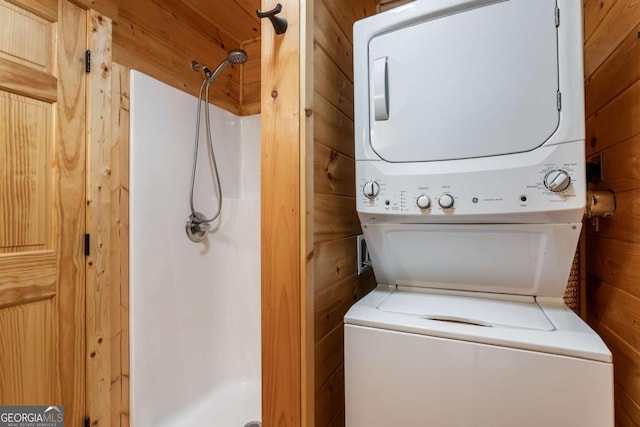 72 Bentley Cv, Murphy, NC 28960 - laundry area featuring stacked washing machine and dryer and wooden walls
