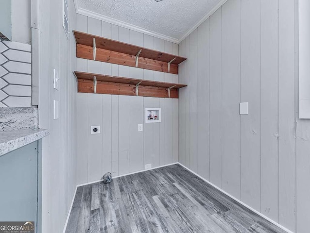 79 Hillside St, Nelson, GA 30151 - laundry room featuring hookup for an electric dryer, wood finished floors, washer hookup, crown molding, and a textured ceiling