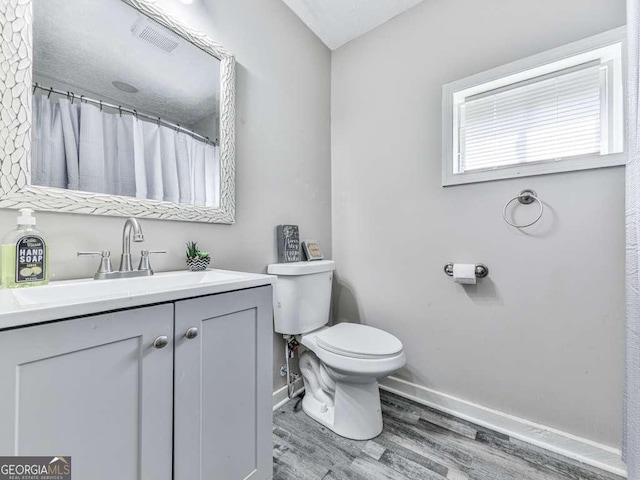 79 Hillside St, Nelson, GA 30151 - bathroom with wood finished floors and vanity