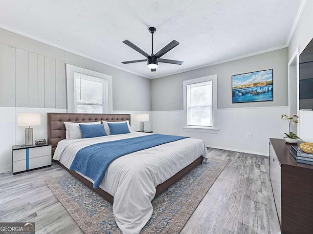 79 Hillside St, Nelson, GA 30151 - bedroom with wood finished floors, crown molding, a wainscoted wall, and a ceiling fan