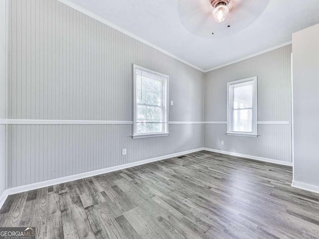 79 Hillside St, Nelson, GA 30151 - spare room with ornamental molding, wood finished floors, and ceiling fan