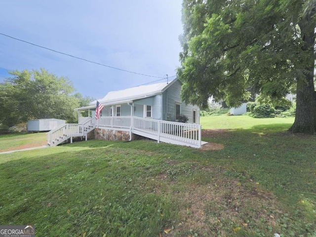 79 Hillside St, Nelson, GA 30151 - view of front of property featuring covered porch and a front lawn