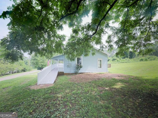 79 Hillside St, Nelson, GA 30151 - back of house with a lawn