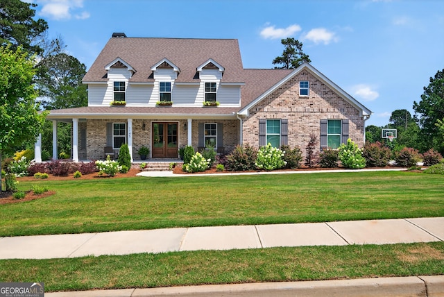 1145 Summerfield Ln, Bogart, GA 30622 - view of front facade with a front lawn, covered porch, brick siding, and a shingled roof
