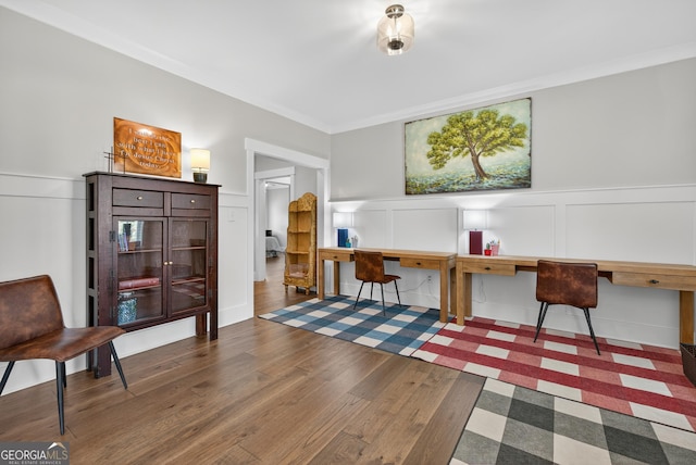 1145 Summerfield Ln, Bogart, GA 30622 - office with wood finished floors, a decorative wall, wainscoting, ornamental molding, and built in desk