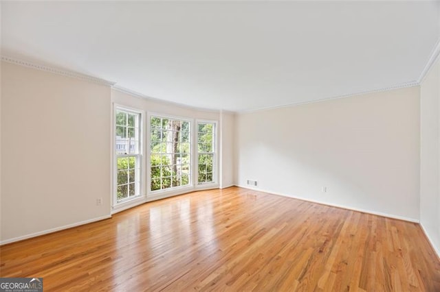 1416 Vernon Rdg, Close, Dunwoody, GA 30338 - spare room with ornamental molding and light wood finished floors