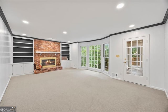 1416 Vernon Rdg, Close, Dunwoody, GA 30338 - unfurnished living room featuring ornamental molding, carpet flooring, built in shelves, recessed lighting, and a fireplace