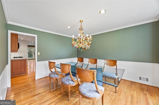 1416 Vernon Rdg, Close, Dunwoody, GA 30338 - dining room with light wood-style flooring, crown molding, a chandelier, and recessed lighting
