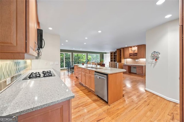1416 Vernon Rdg, Close, Dunwoody, GA 30338 - kitchen featuring stainless steel dishwasher, gas cooktop, light wood-style floors, recessed lighting, and a kitchen island with sink