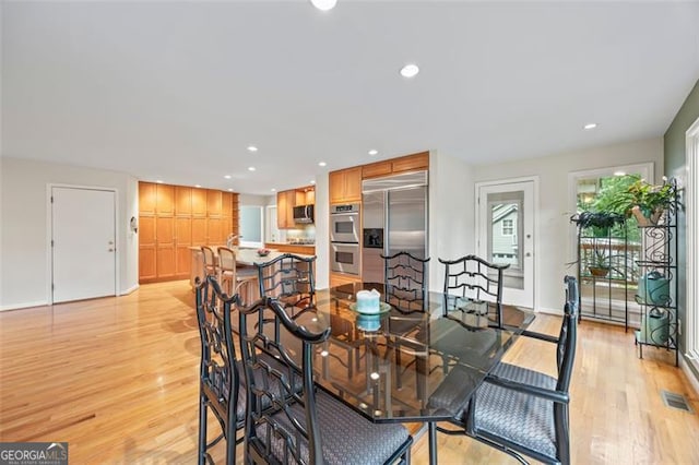 1416 Vernon Rdg, Close, Dunwoody, GA 30338 - dining area featuring light wood finished floors and recessed lighting