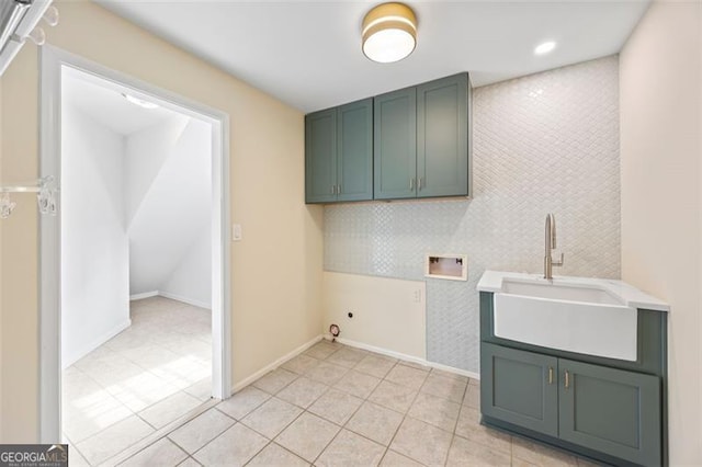 1416 Vernon Rdg, Close, Dunwoody, GA 30338 - laundry area with washer hookup, cabinet space, light tile patterned floors, and an accent wall