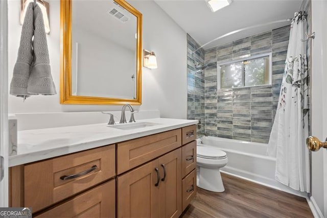 1416 Vernon Rdg, Close, Dunwoody, GA 30338 - bathroom with vanity, wood finished floors, and shower / tub combo