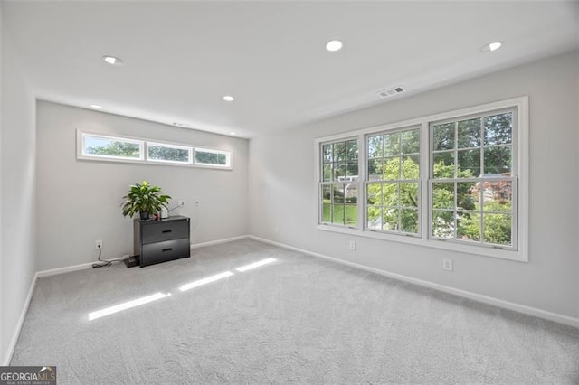 1416 Vernon Rdg, Close, Dunwoody, GA 30338 - carpeted spare room with plenty of natural light and recessed lighting