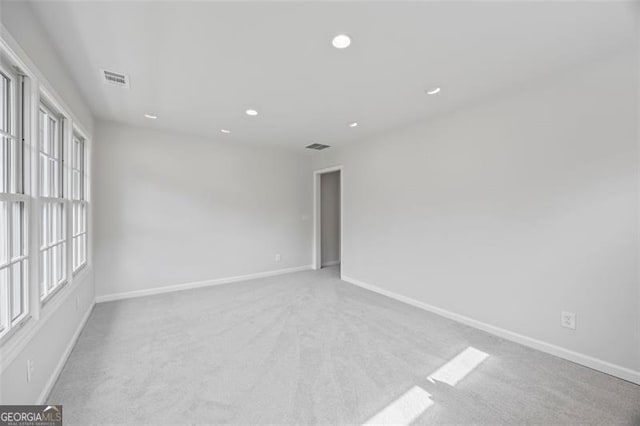 1416 Vernon Rdg, Close, Dunwoody, GA 30338 - unfurnished room with carpet flooring and recessed lighting