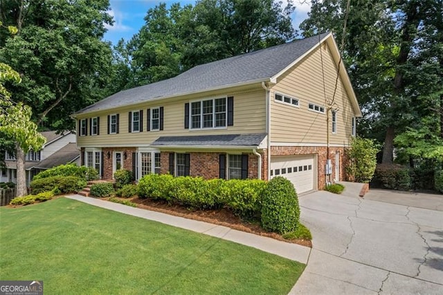 1416 Vernon Rdg, Close, Dunwoody, GA 30338 - view of front of property with brick siding, driveway, a garage, a front lawn, and roof with shingles