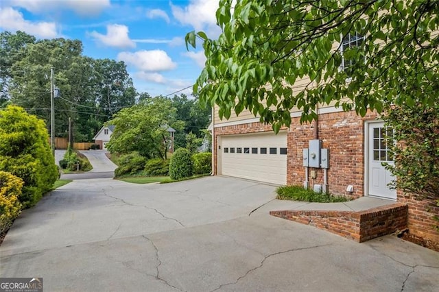 1416 Vernon Rdg, Close, Dunwoody, GA 30338 - garage with concrete driveway