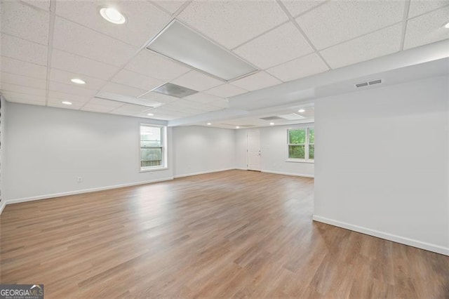 1416 Vernon Rdg, Close, Dunwoody, GA 30338 - spare room featuring wood finished floors, a paneled ceiling, and recessed lighting