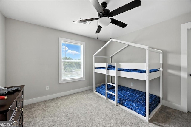 161 Fairway Cir, Macon, GA 31211 - carpeted bedroom with baseboards and a ceiling fan