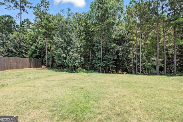 161 Fairway Cir, Macon, GA 31211 - view of yard with a wooded view