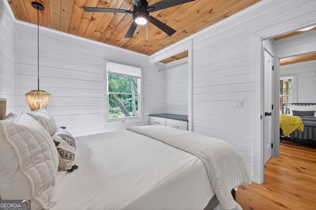 211 Rockhouse Rd, Cherry Log, GA 30522 - bedroom featuring light wood-style flooring, wooden ceiling, and wooden walls
