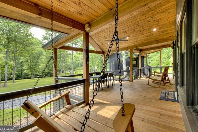 211 Rockhouse Rd, Cherry Log, GA 30522 - deck with outdoor dining area and view of scattered trees