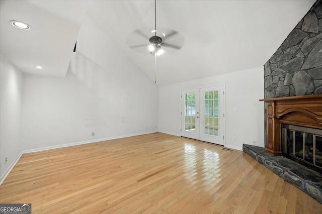171 Loraine Forest Dr, Macon, GA 31210 - unfurnished living room featuring a ceiling fan, light wood-style floors, a fireplace, recessed lighting, and french doors
