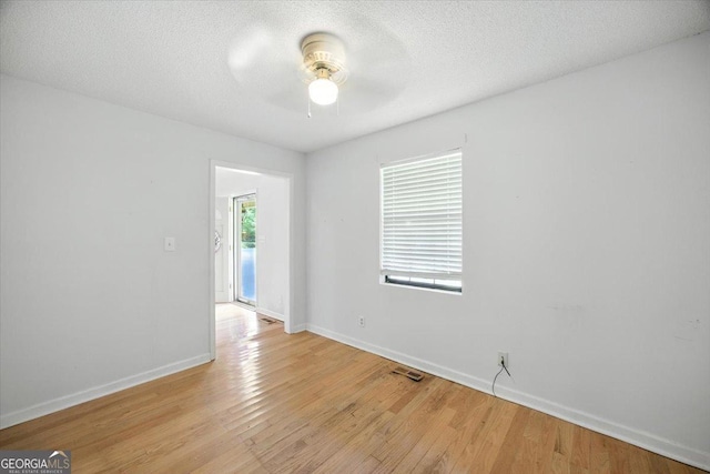 171 Loraine Forest Dr, Macon, GA 31210 - unfurnished room featuring a ceiling fan, light wood-type flooring, and a textured ceiling