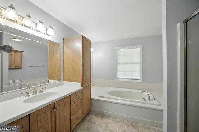 171 Loraine Forest Dr, Macon, GA 31210 - bathroom with a garden tub and vanity