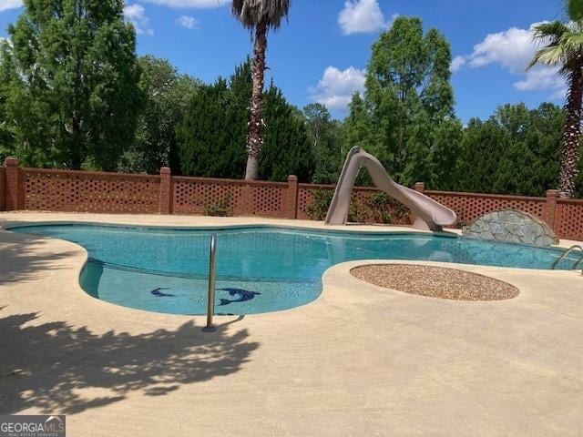 550 Masters Cir, Dublin, GA 31021 - view of swimming pool featuring a water slide