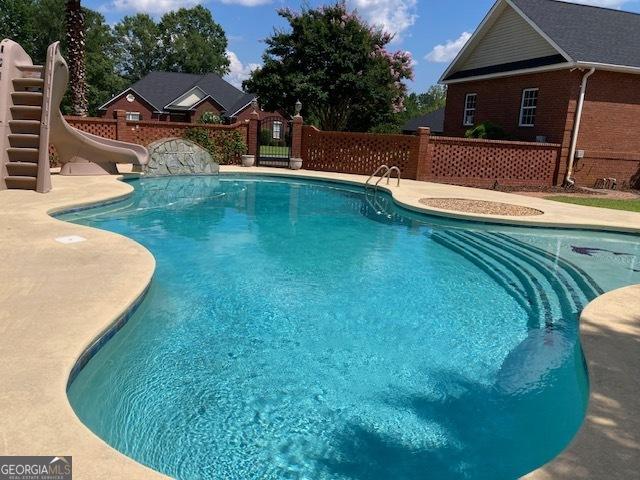 550 Masters Cir, Dublin, GA 31021 - view of pool with a water slide