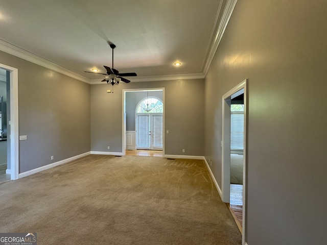 550 Masters Cir, Dublin, GA 31021 - carpeted empty room featuring crown molding and a ceiling fan