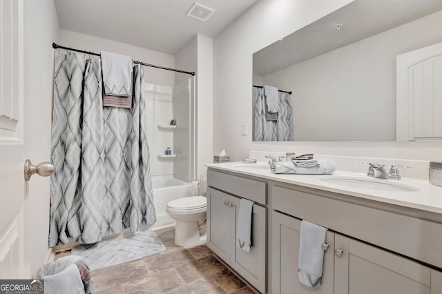 7730 Demeter Dr, Fairburn, GA 30213 - bathroom with double vanity and shower / bath combo with shower curtain