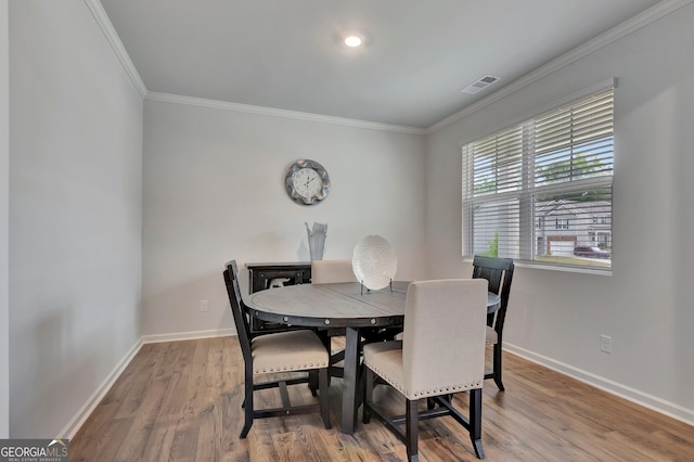 7730 Demeter Dr, Fairburn, GA 30213 - dining room featuring crown molding and wood finished floors