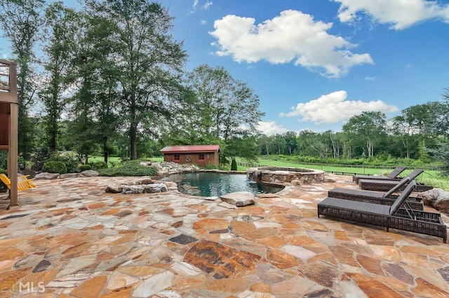 685 N Mcdonough Rd Unit 48.26/-, Acres, Griffin, GA 30223 - view of patio with a pool with connected hot tub and a shed