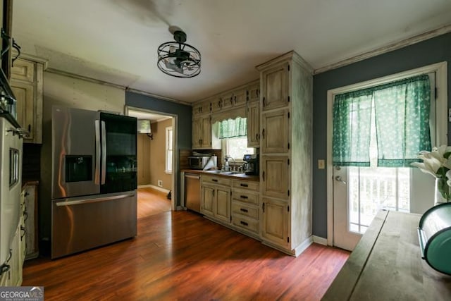 1025 Northridge Rd, Ball Ground, GA 30107 - kitchen featuring appliances with stainless steel finishes, dark wood finished floors, and ornamental molding