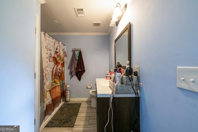 1025 Northridge Rd, Ball Ground, GA 30107 - full bathroom with vanity, ornamental molding, a shower with curtain, and wood finished floors